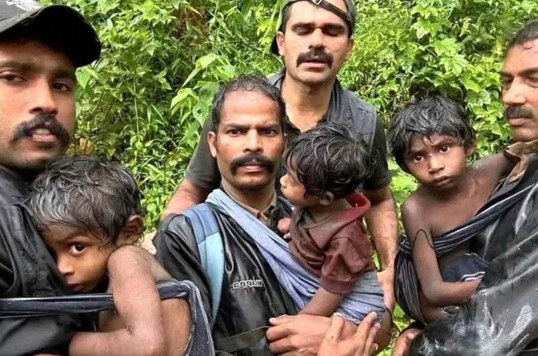 forest officers save tribal family in Wayanad - X